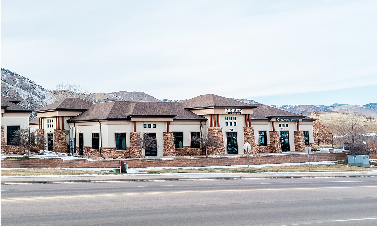 Dental office building with mountains in background.
