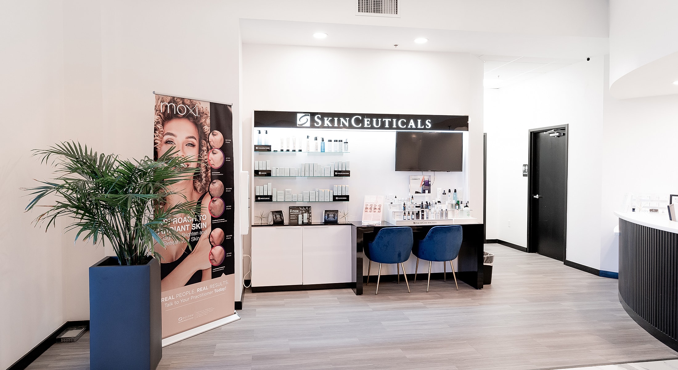Spa interior with skincare products and signage.