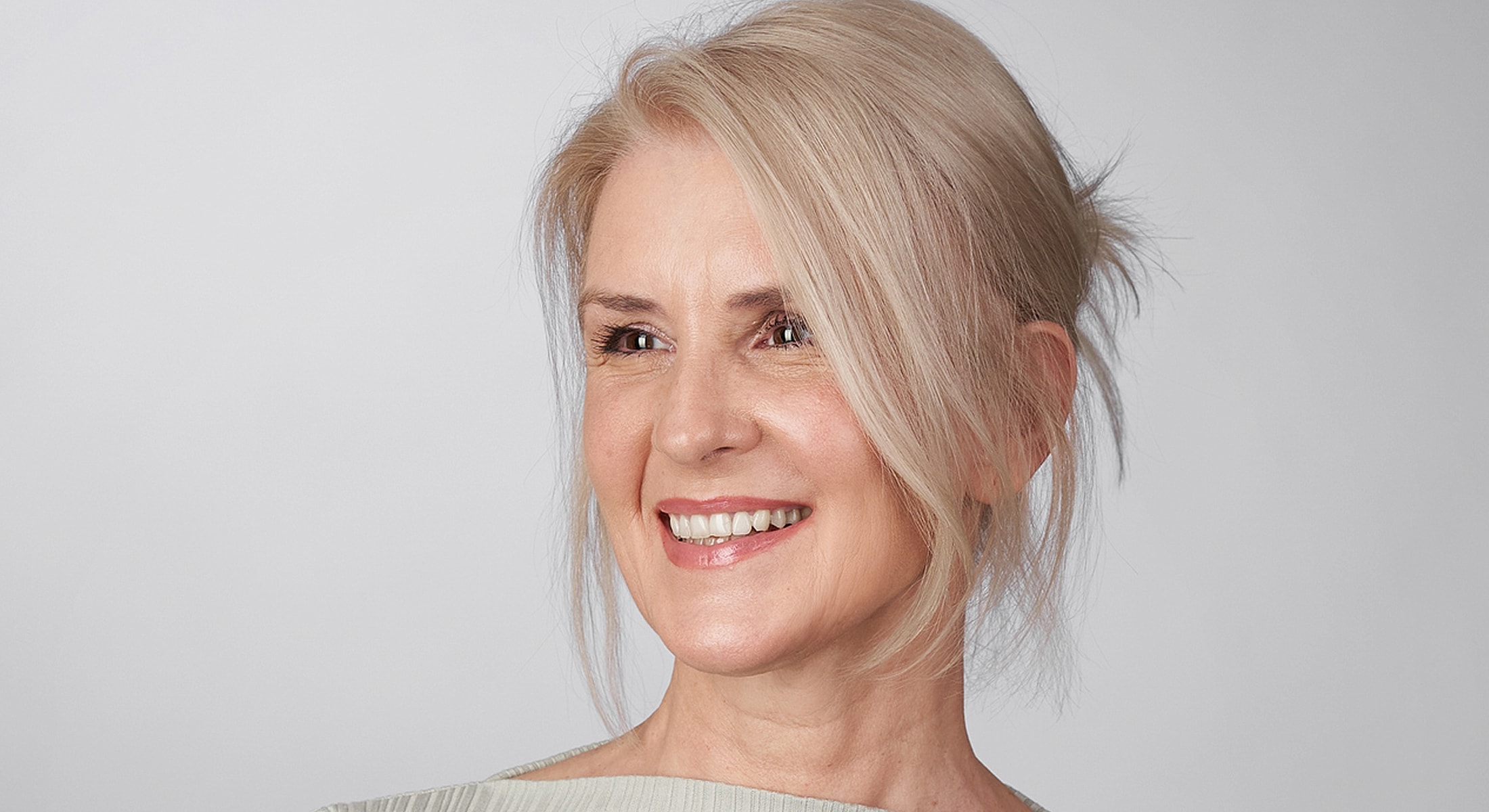 Denver Microneedling model with blonde hair.