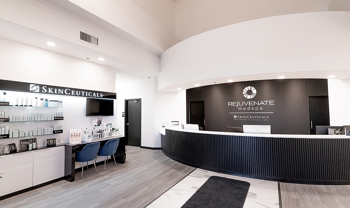 Modern medspa reception area with skincare products.